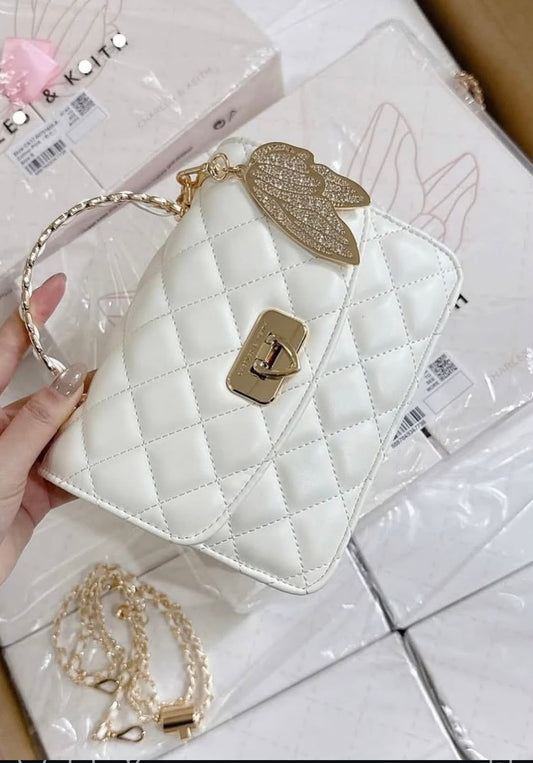 CHARLES & KEITH | Cressida Quilted Top Handle Bag With Bag Charms with Box
