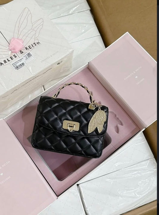 CHARLES & KEITH | Cressida Quilted Top Handle Bag With Bag Charms with Box